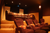 Home Theater - Multi-level theater with massage chairs and leather theater seating