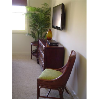Wall-mounted flat panel in villa bedroom